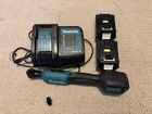 Makita Ratchet (XRW01Z) With Two 4.0 Batteries And Charger Used. Price: $240.00.