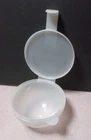 Tupperware Forget Me Not Onion/tomato Hanging Keeper Clear 5105A-4 Used. Price: $12.95.